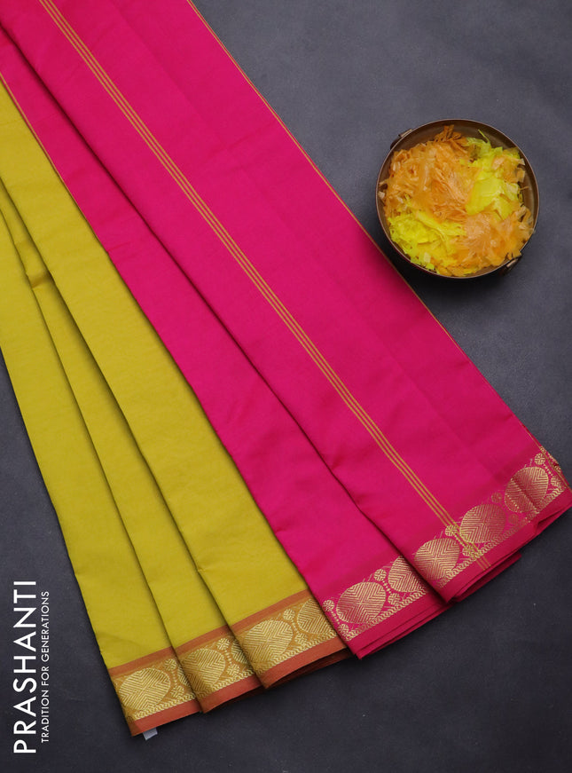 Semi silk cotton saree lime yellow and pink with plain body and zari woven border