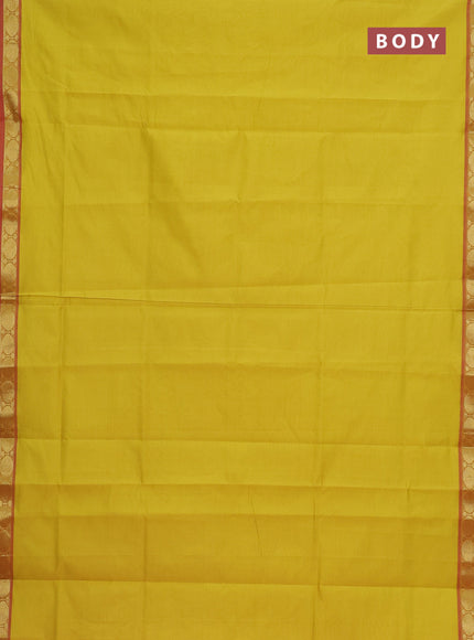 Semi silk cotton saree lime yellow and pink with plain body and zari woven border