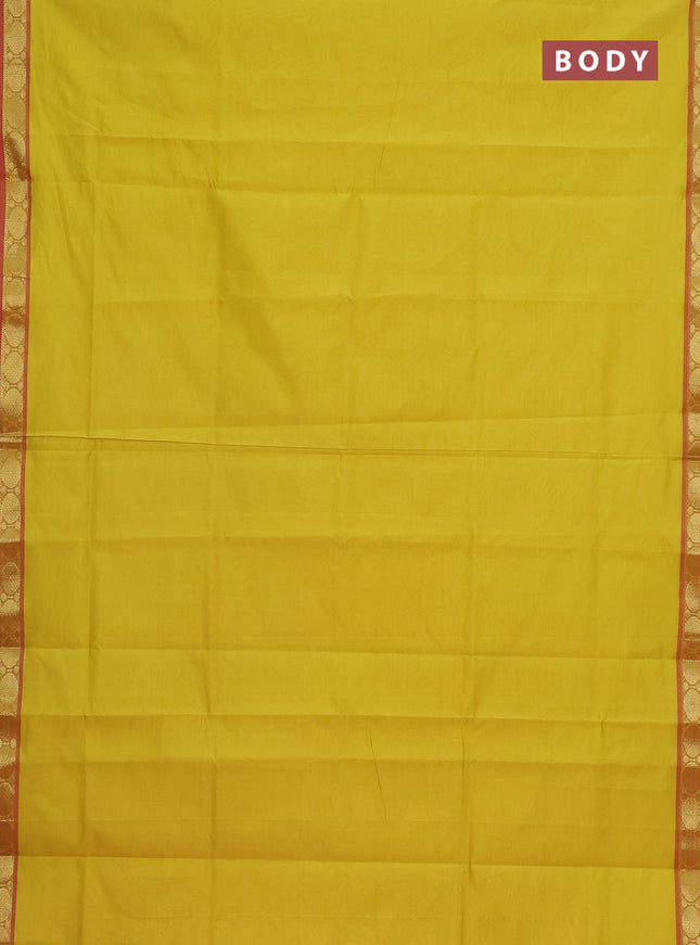 Semi silk cotton saree lime yellow and pink with plain body and zari woven border