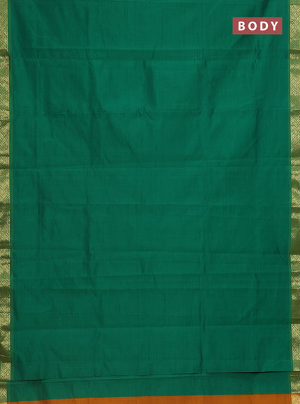 Semi silk cotton saree green and dark mustard with plain body and zari woven border