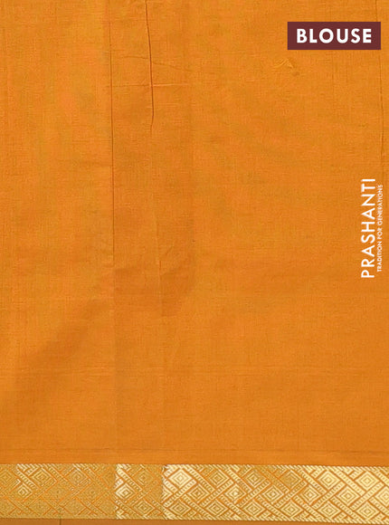 Semi silk cotton saree green and dark mustard with plain body and zari woven border