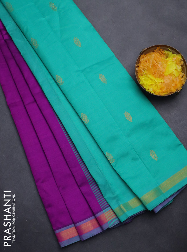 Semi silk cotton saree purple and teal green with zari woven buttas and zari woven border