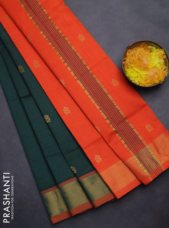 Semi silk cotton saree bottle green and orange with zari woven buttas and zari woven border