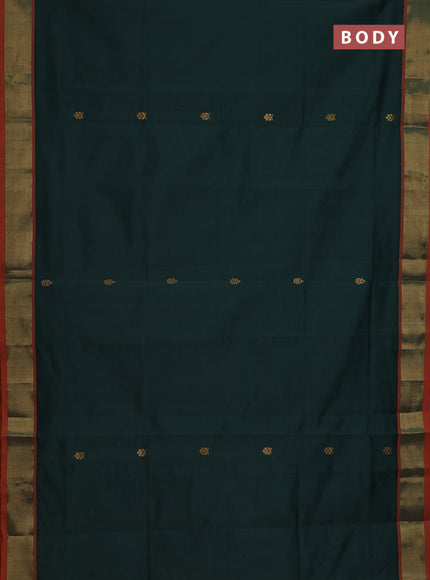 Semi silk cotton saree bottle green and orange with zari woven buttas and zari woven border