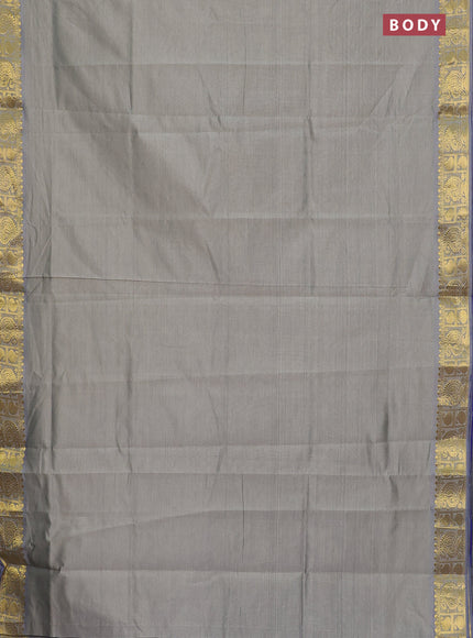 Semi silk cotton saree grey shade and blue with plain body and paisley zari woven border