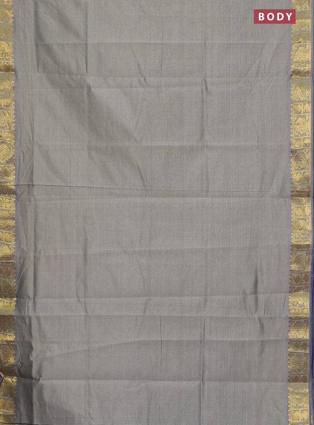 Semi silk cotton saree grey shade and blue with plain body and paisley zari woven border