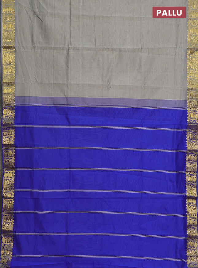 Semi silk cotton saree grey shade and blue with plain body and paisley zari woven border