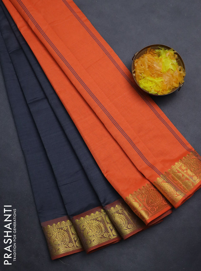 Semi silk cotton saree grey and orange with plain body and paisley zari woven border