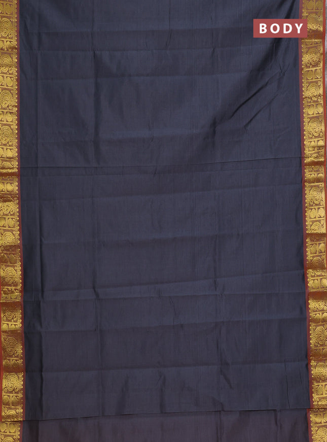 Semi silk cotton saree grey and orange with plain body and paisley zari woven border
