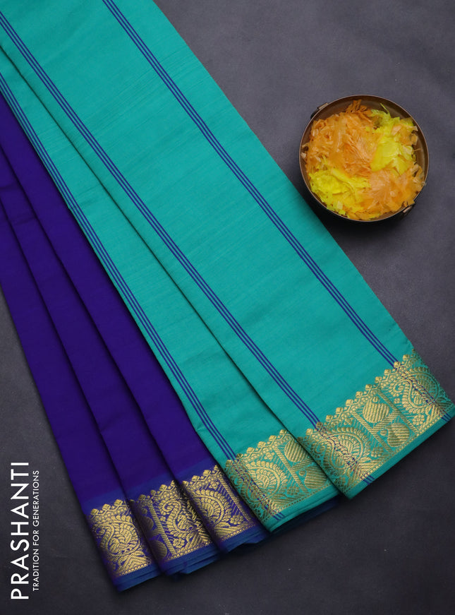 Semi silk cotton saree blue and teal green shade with plain body and paisley zari woven border