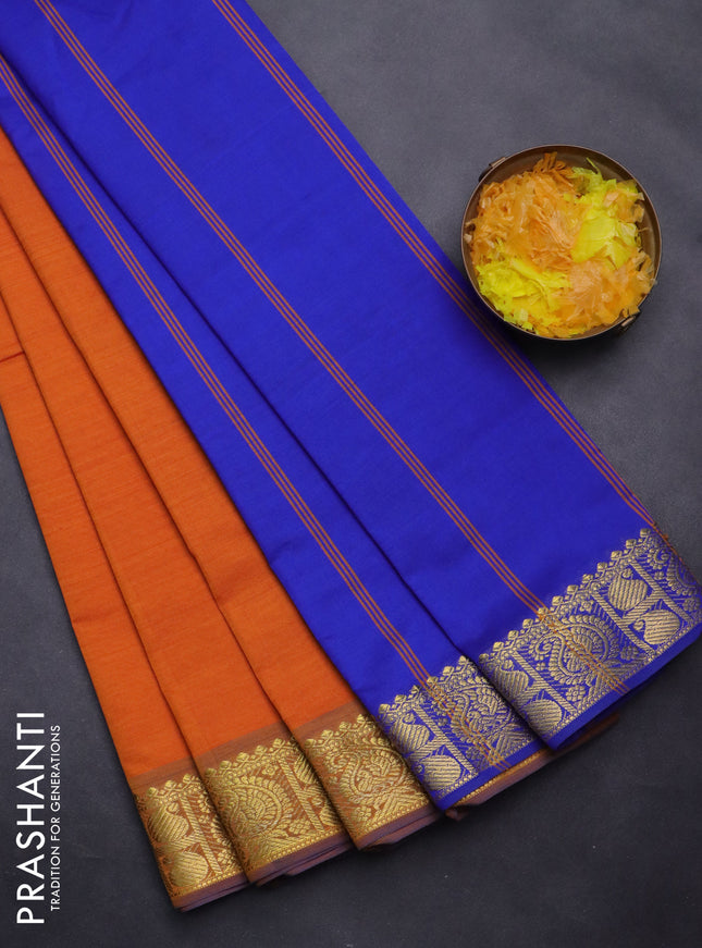 Semi silk cotton saree orange and blue with plain body and paisley zari woven border