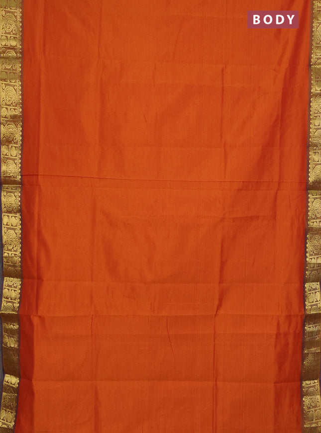 Semi silk cotton saree orange and blue with plain body and paisley zari woven border
