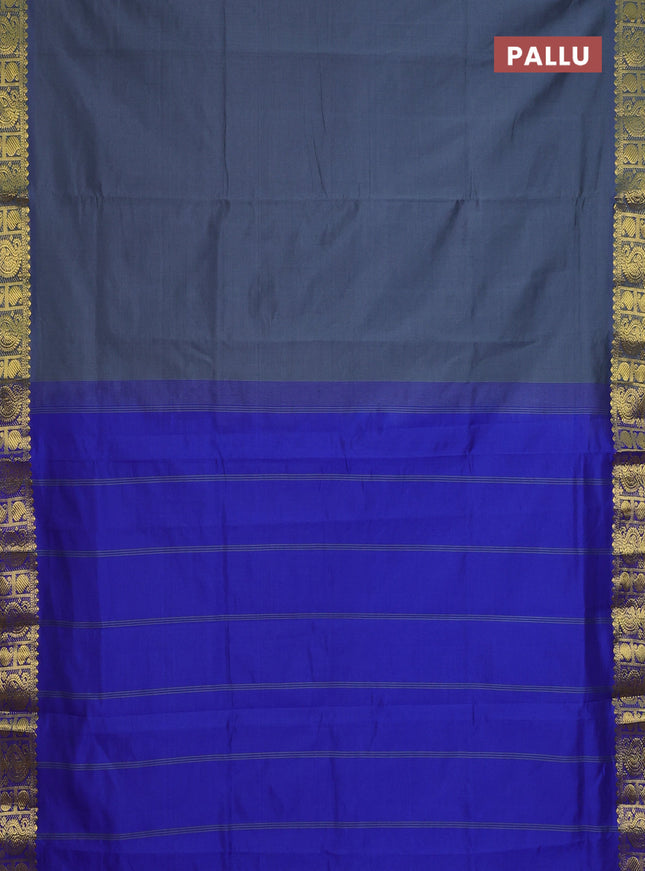 Semi silk cotton saree grey and blue with plain body and paisley zari woven border