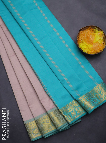 Semi silk cotton saree beige and teal blue with plain body and zari woven border