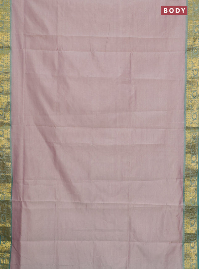 Semi silk cotton saree beige and teal blue with plain body and zari woven border