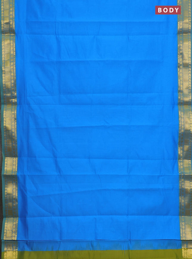 Semi silk cotton saree blue and light green with plain body and zari woven border