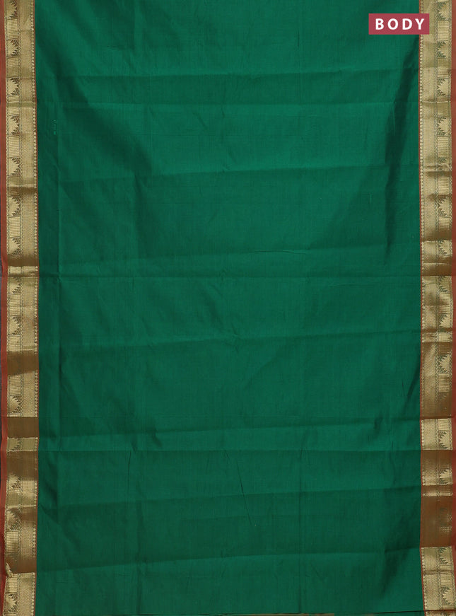 Semi silk cotton saree green and orange with plain body and zari woven border