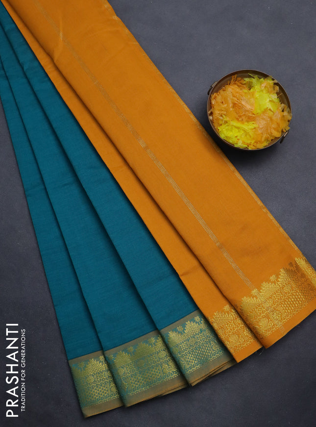 Semi silk cotton saree teal green and mango yellow with plain body and zari woven border