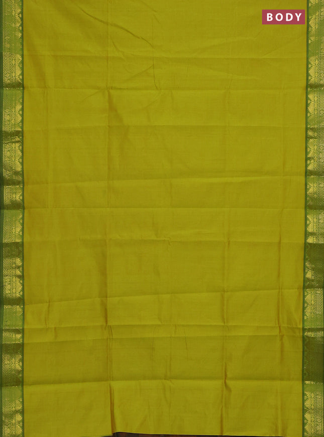 Semi silk cotton saree dual shade of lime green and black with plain body and zari woven border