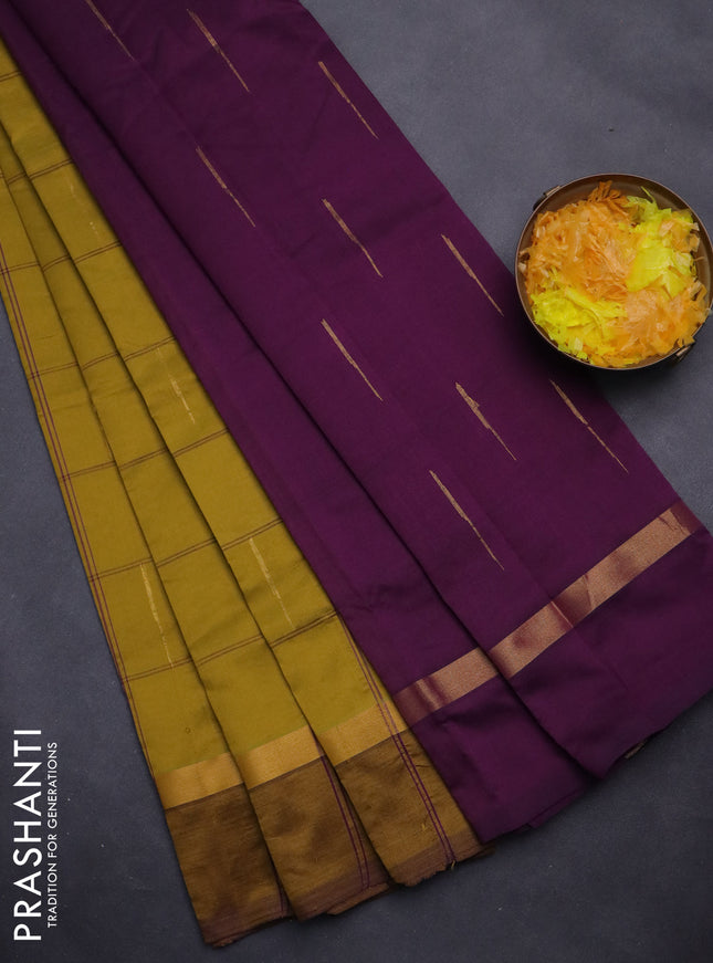 Semi silk cotton saree dark mustard and purple with allover checks & zari buttas and zari woven simple border