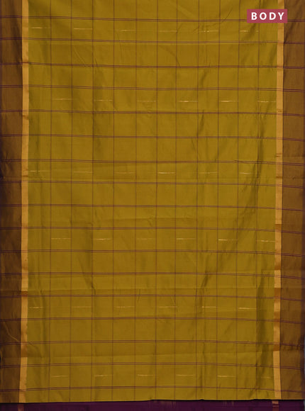 Semi silk cotton saree dark mustard and purple with allover checks & zari buttas and zari woven simple border
