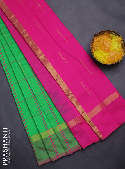 Semi silk cotton saree parrot green and pink with allover checks & zari buttas and zari woven simple border
