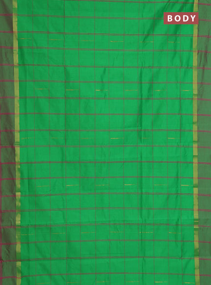 Semi silk cotton saree parrot green and pink with allover checks & zari buttas and zari woven simple border