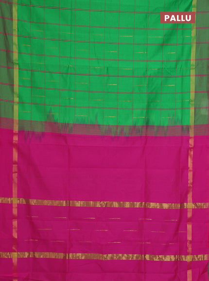 Semi silk cotton saree parrot green and pink with allover checks & zari buttas and zari woven simple border