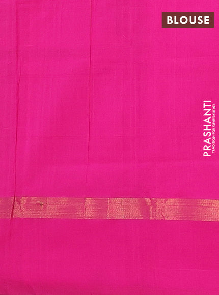 Semi silk cotton saree parrot green and pink with allover checks & zari buttas and zari woven simple border