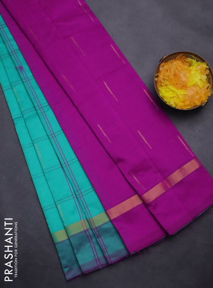 Semi silk cotton saree teal green shade and purple with allover checks & zari buttas and zari woven simple border