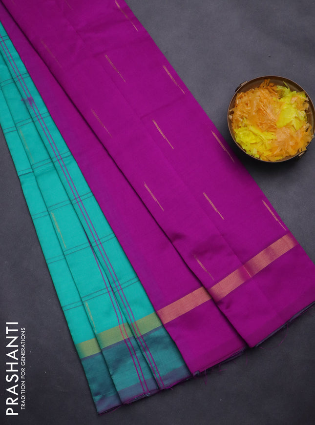 Semi silk cotton saree teal green shade and purple with allover checks & zari buttas and zari woven simple border