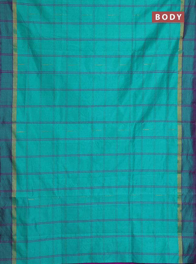 Semi silk cotton saree teal green shade and purple with allover checks & zari buttas and zari woven simple border