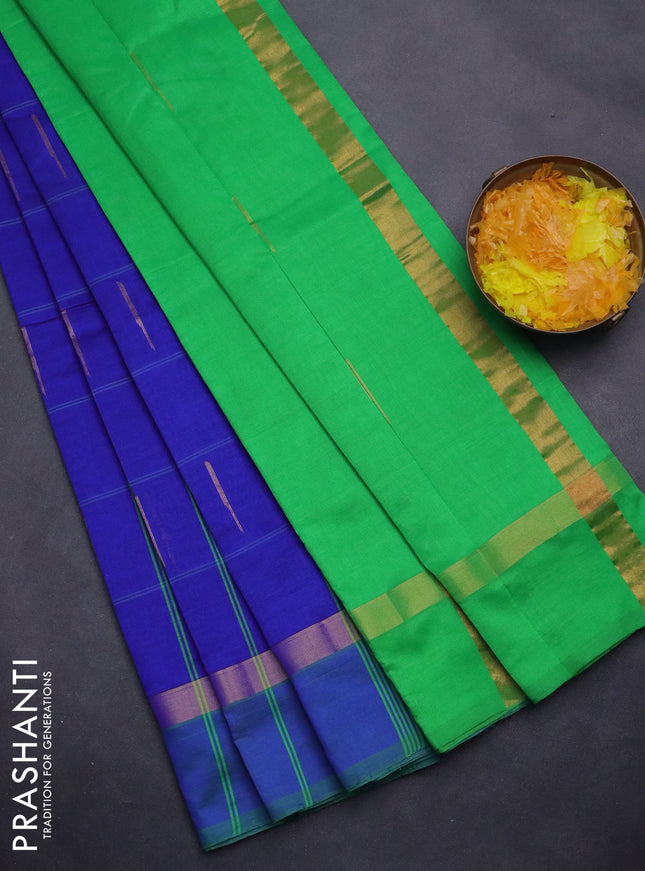 Semi silk cotton saree blue and parrot green with allover checks & zari buttas and zari woven simple border