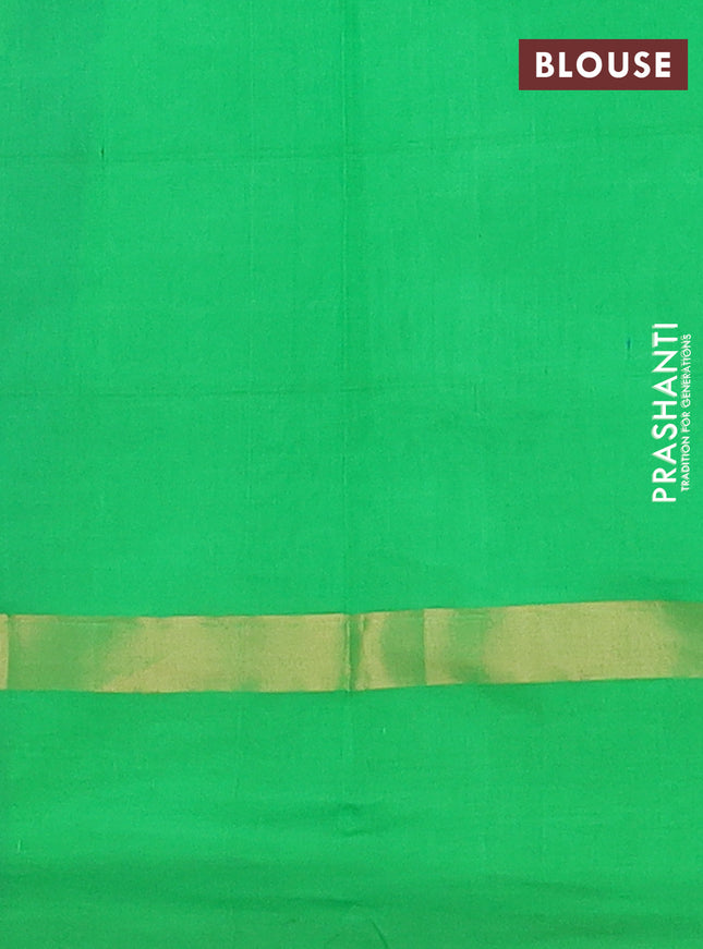 Semi silk cotton saree blue and parrot green with allover checks & zari buttas and zari woven simple border