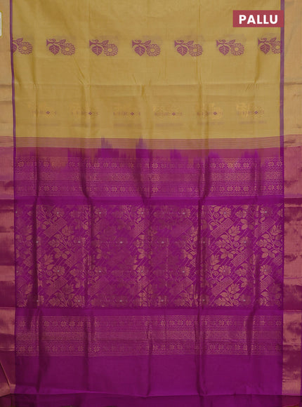 Semi silk cotton saree yellow shade and purple with thread & zari woven buttas and zari woven border