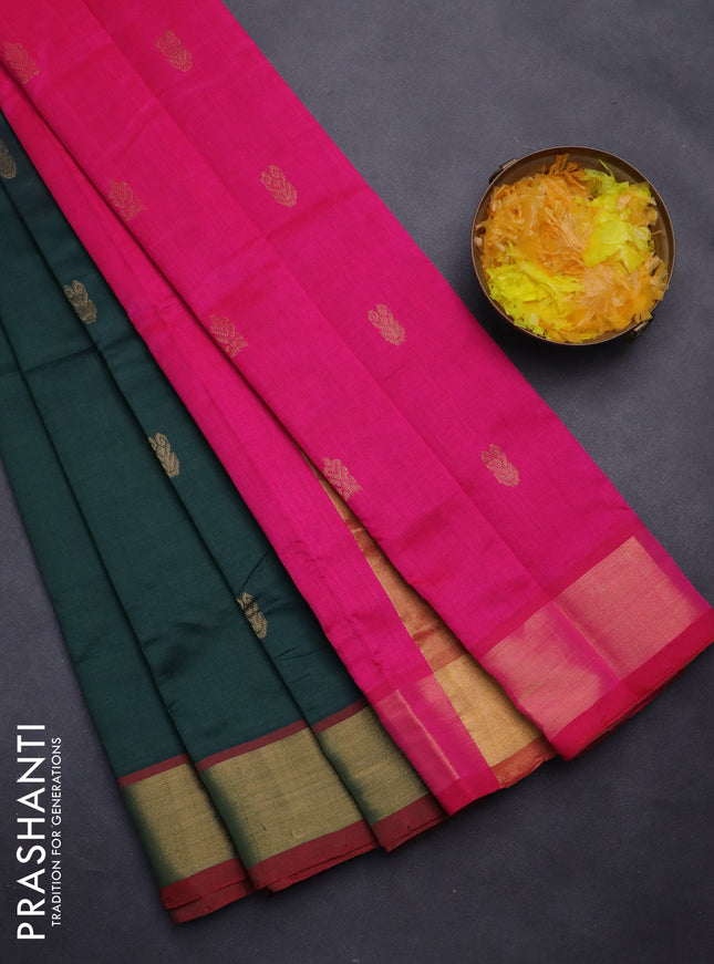 Semi silk cotton saree bottle green and pink with zari woven buttas and zari woven border