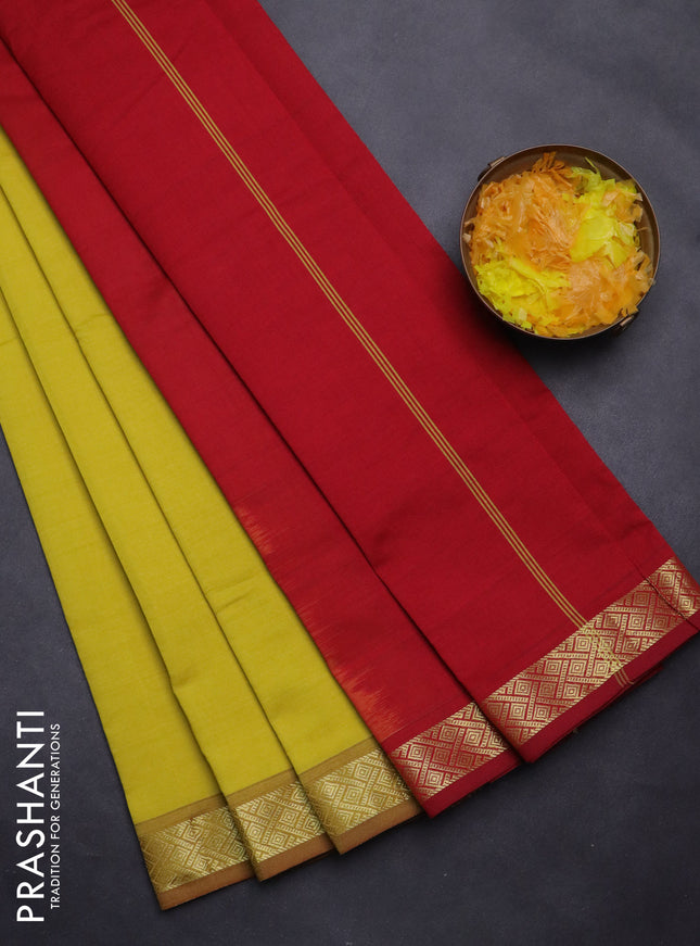 Semi silk cotton saree lime yellow and red with plain body and zari woven border