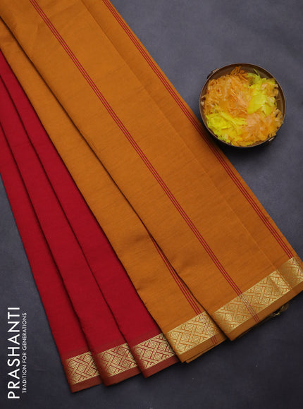 Semi silk cotton saree red and mustard yellow with plain body and zari woven border