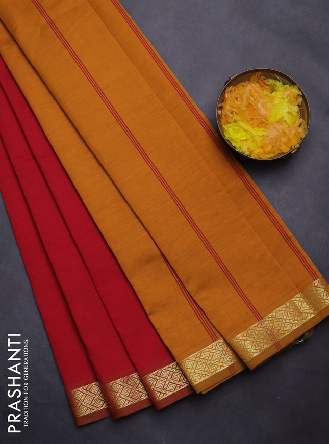 Semi silk cotton saree red and mustard yellow with plain body and zari woven border