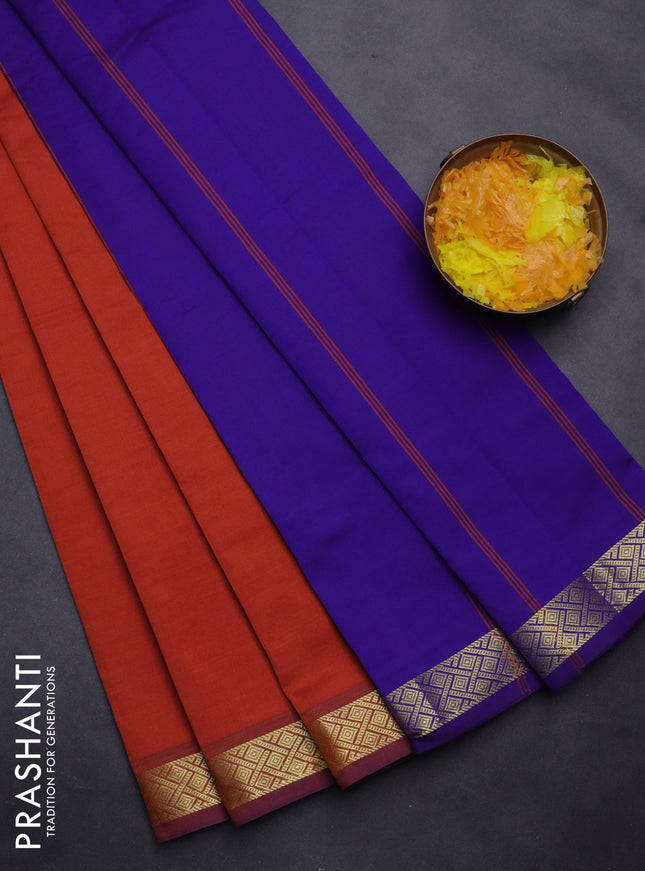 Semi silk cotton saree rustic orange and violet with plain body and zari woven border
