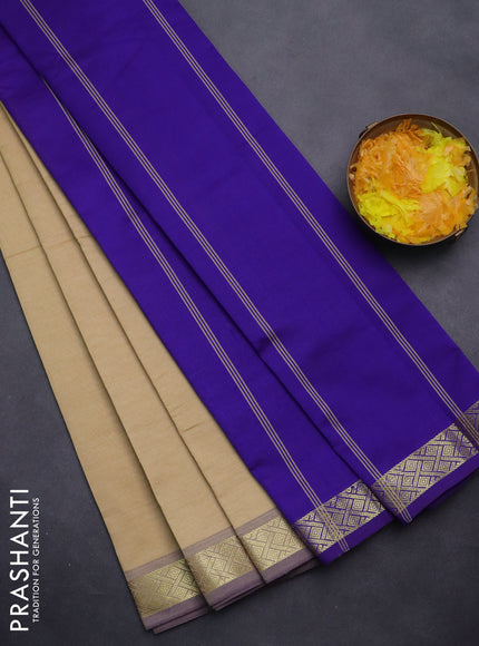 Semi silk cotton saree sandal and violet with plain body and zari woven border