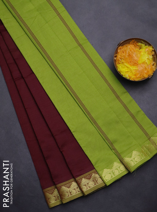 Semi silk cotton saree maroon and light green with plain body and zari woven border