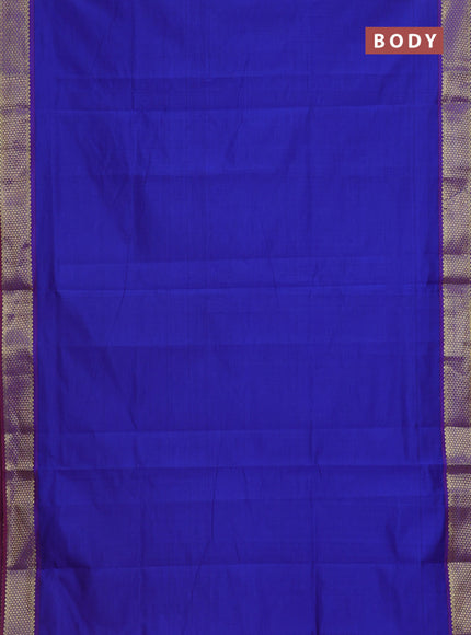 Semi silk cotton saree blue and rust shade with plain body and zari woven border