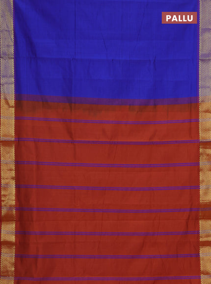 Semi silk cotton saree blue and rust shade with plain body and zari woven border