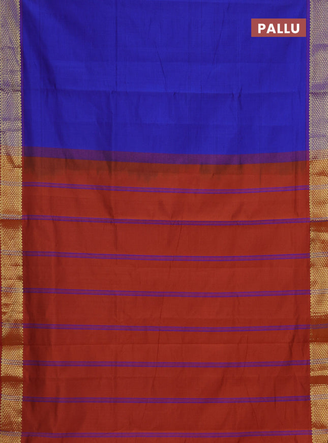 Semi silk cotton saree blue and rust shade with plain body and zari woven border
