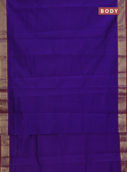 Semi silk cotton saree blue and rust shade with plain body and zari woven border