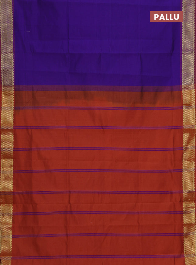 Semi silk cotton saree blue and rust shade with plain body and zari woven border