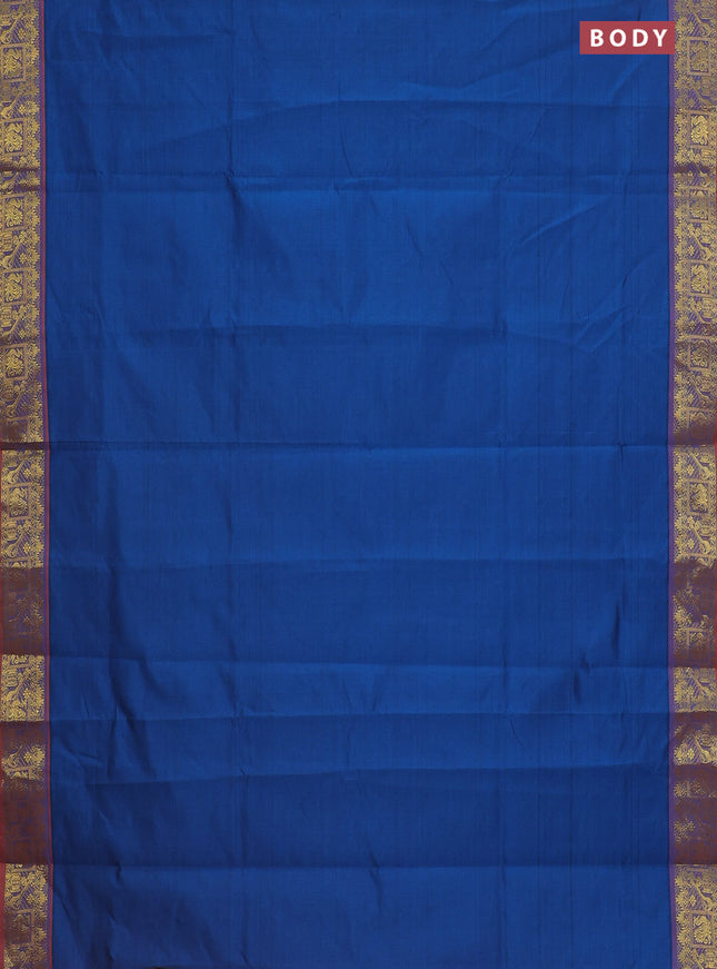 Semi silk cotton saree peacock blue and orange with plain body and zari woven border