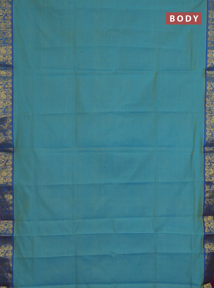 Semi silk cotton saree dual shade of teal blue and purple with plain body and zari woven border