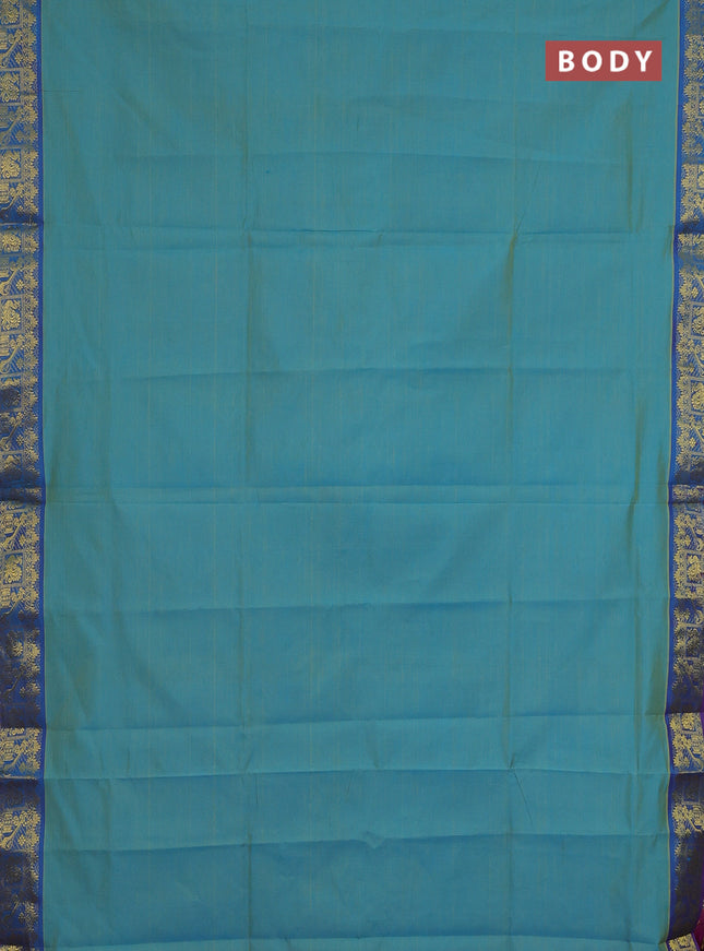 Semi silk cotton saree dual shade of teal blue and purple with plain body and zari woven border
